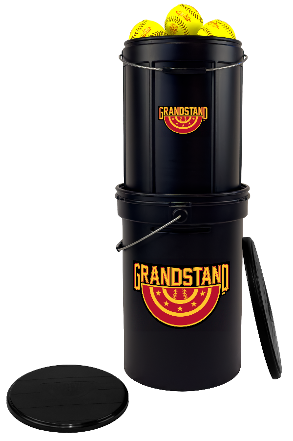 Black bucket with yellow balls on top, branded 'Grandstand'. softball bucket, ball caddy